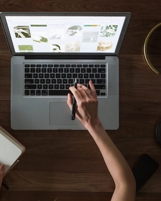 A laptop and a smartphone on a desk